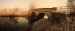 bridge over river in mist