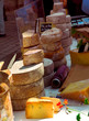 Assorted cheeses for sale on french farmers market Assorted cheeses for sale on french farmers market