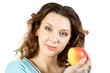 Young women with apple. Isolate on white.