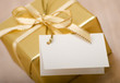 golden gift box with empty card close up shoot