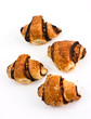 Foto: Croissant by a breakfast on a white background Croissant by a breakfast on a white background