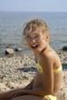 Happy girl portrait on the beach