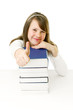 Portrait of Happy young schoolgirl reading book