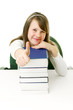 Portrait of Happy young schoolgirl reading book
