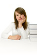 Portrait of Happy young schoolgirl reading book