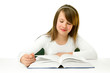 Portrait of Happy young schoolgirl reading book