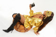 Sexy girl in golden mask & dress with old photo camera. Sexy girl in golden mask & dress with old photo camera.