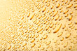 water drops background, abstract macro on golden surface water drops background, abstract macro on golden surface
