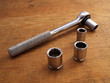 Socket wrench with 3 extra sockets