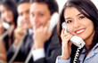 customer support team lead by a friendly girl smiling 