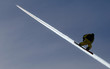 Snowboarder am Kondensstreifen Snowboarder am Kondensstreifen