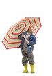 Boy looking up from under his umbrella to check the weather. Boy looking up from under his umbrella to check the weather.