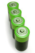 Four green batteries on white background. Four green batteries on white background.