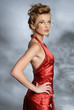 Fashionable Woman in red dress with hand on hip Fashionable Woman in red dress with hand on hip