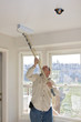 Contract painter painting ceilings
