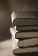 Sepia toned photo of a stack of old books Sepia toned photo of a stack of old books