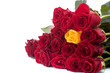 one yellow rose in a bouquet of red roses on white
