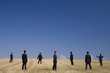 multiple businessman in the field working together
