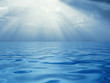 Solar beams above a quiet surface of ocean Solar beams above a quiet surface of ocean
