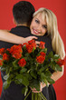 Young couple in happy hug. 