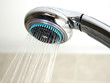 Shower with running water in the bathroom Shower with running water in the bathroom