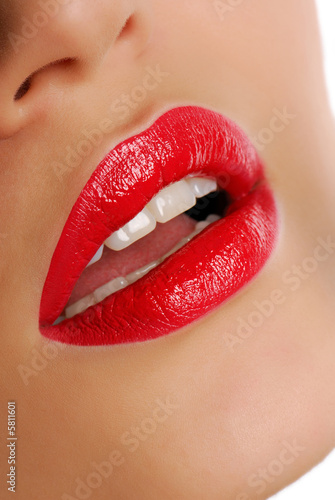 Woman lips with Red bright lipstick.