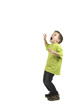 Photo: This boy is very scared. Against a white background. This boy is very scared. Against a white background.