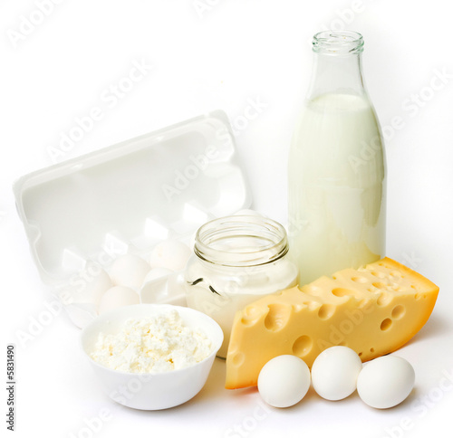 Fresh eggs and dairy products in glass containers