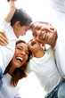 family lifestyle portrait of a mum and dad with their two kids 