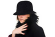 Foto: Incognito woman face in hat and coat Incognito woman face in hat and coat