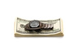 Dollars and watch on white background