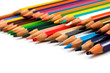 Assortment of coloured pencils on white background