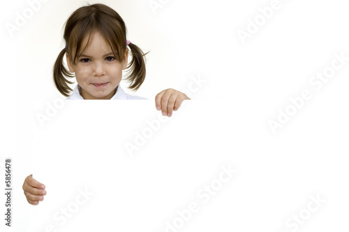 little girl holding a white banner isolated on white