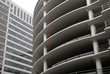 Curved concrete parking structure & generic office building Curved concrete parking structure & generic office building