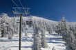 Photo: Skiers are riding lift on a very cold day (Sierra Nevada, USA). Skiers are riding lift on a very cold day (Sierra Nevada, USA).