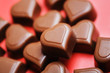 Photo en ligne au meilleur prix Heart shaped chocolates. Short depth of field.
