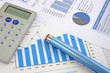 Business Background: Financial report, pen and Calculator Business Background: Financial report, pen and Calculator