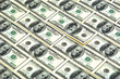 Photo: angled background image of hundred dollar bills angled background image of hundred dollar bills