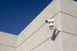 A security camera watches over a building