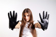 pretty woman with long hair and black leather glove