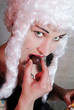 friendly woman with white peruke and chocolate