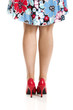 Beautiful picture of female legs with red shoes