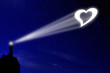 The love lighthouse projects a heart signal