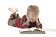 5 year old reading a book, isolated on white. 