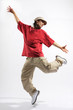 hip-hop style dancer posing on isolated background