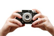 hands holding an old camera