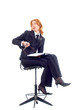 Young red-haired businesswoman with pen and notebook