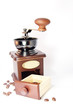 Coffee grinder with beans isolated on white Coffee grinder with beans isolated on white