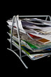 Messy in-basket with papers Messy in-basket with papers
