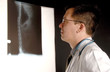 Doctor Looking at an X-Ray